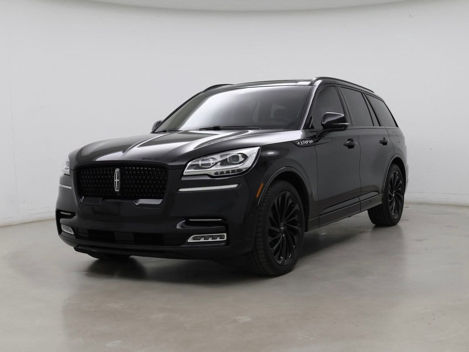 JM Transportation Service - Black luxury SUV with blacked-out wheels and grille for premium private transportation in Los Angeles