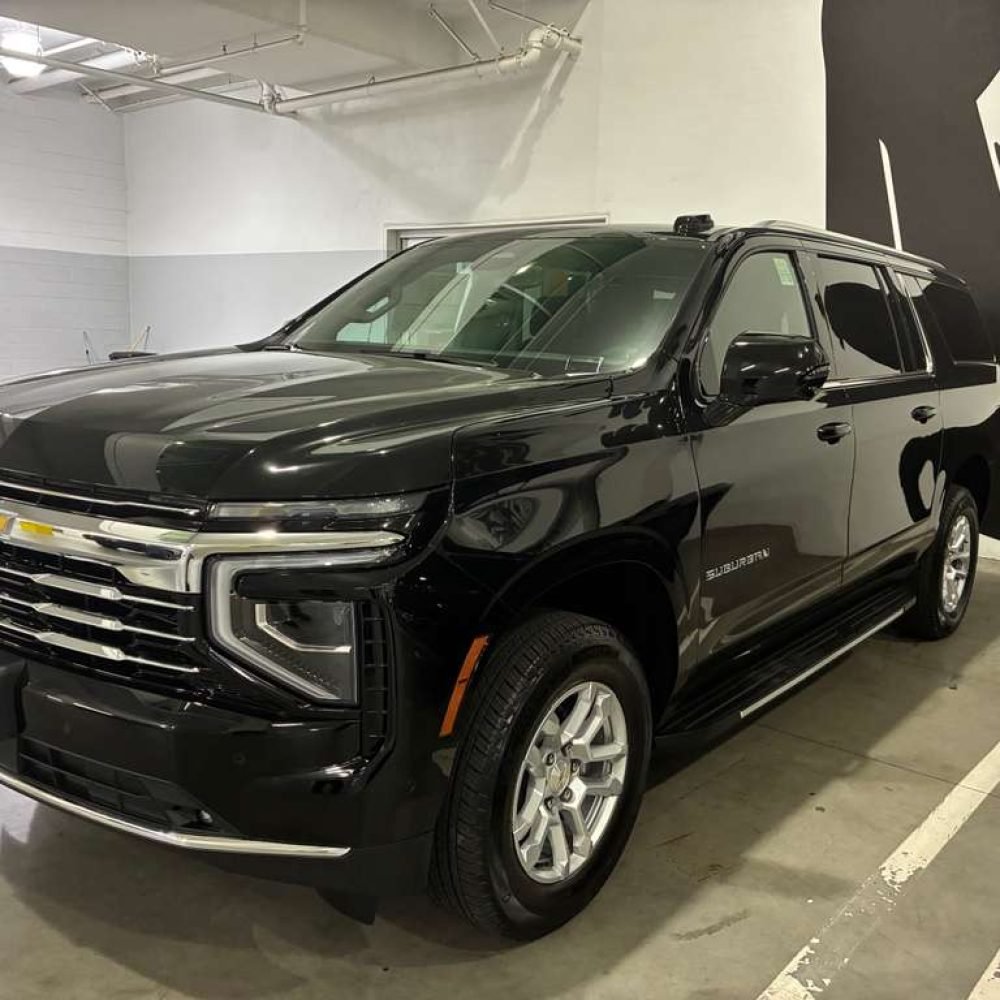 JM Transportation Service - 2025 Black Chevrolet Suburban SUV Front Quarter View
