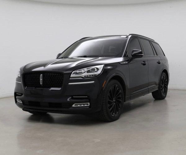JM Transportation Service - Black luxury SUV with blacked-out wheels and grille for premium private transportation in Los Angeles