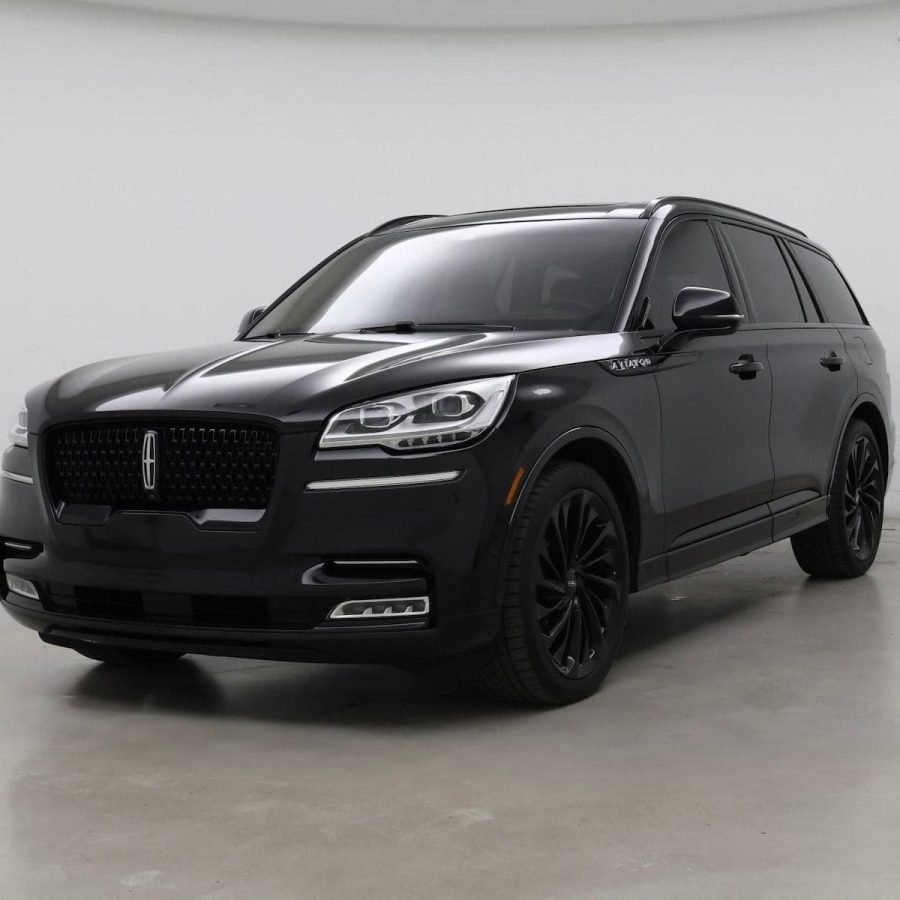 JM Transportation Service - Black luxury SUV with blacked-out wheels and grille for premium private transportation in Los Angeles