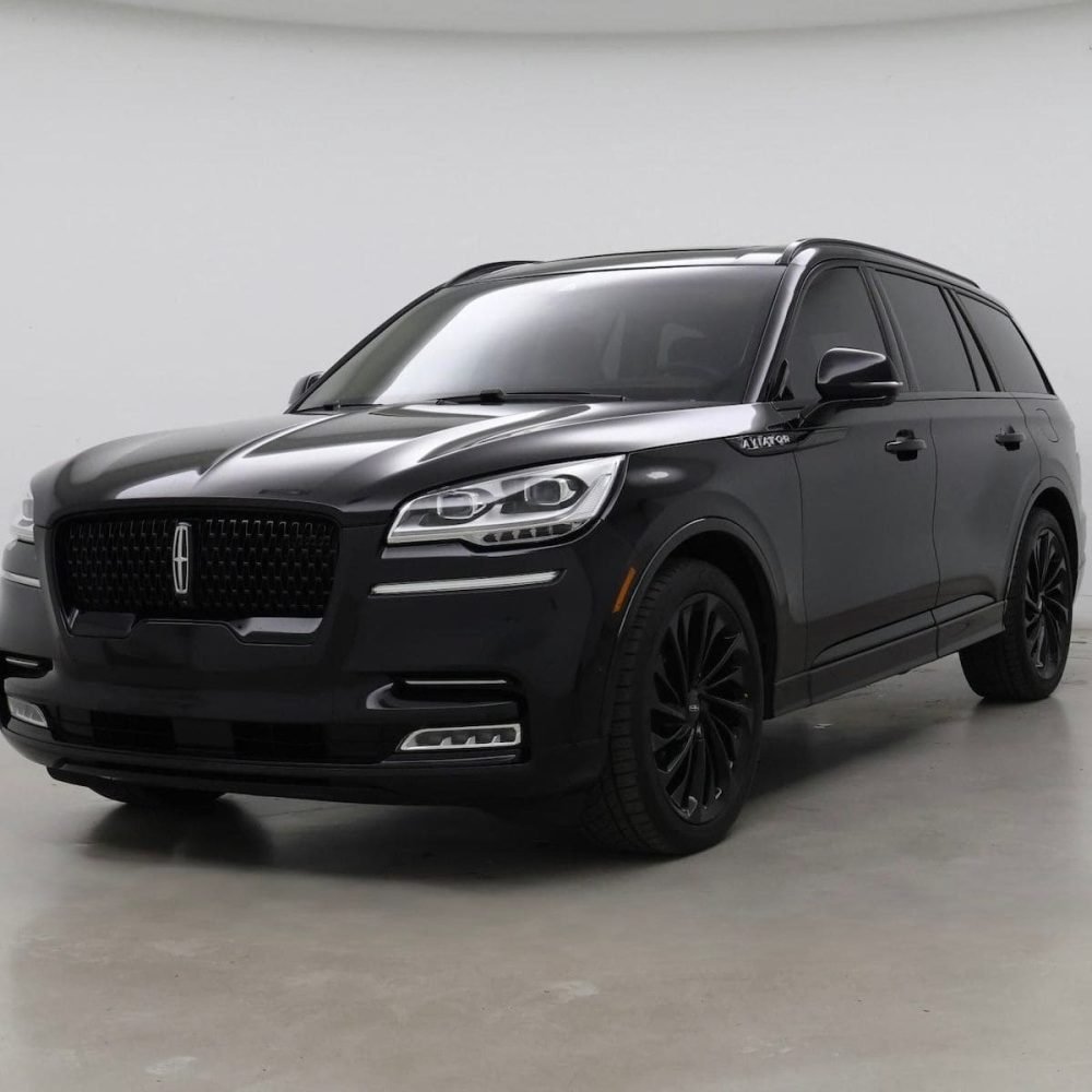 JM Transportation Service - Black luxury SUV with blacked-out wheels and grille for premium private transportation in Los Angeles
