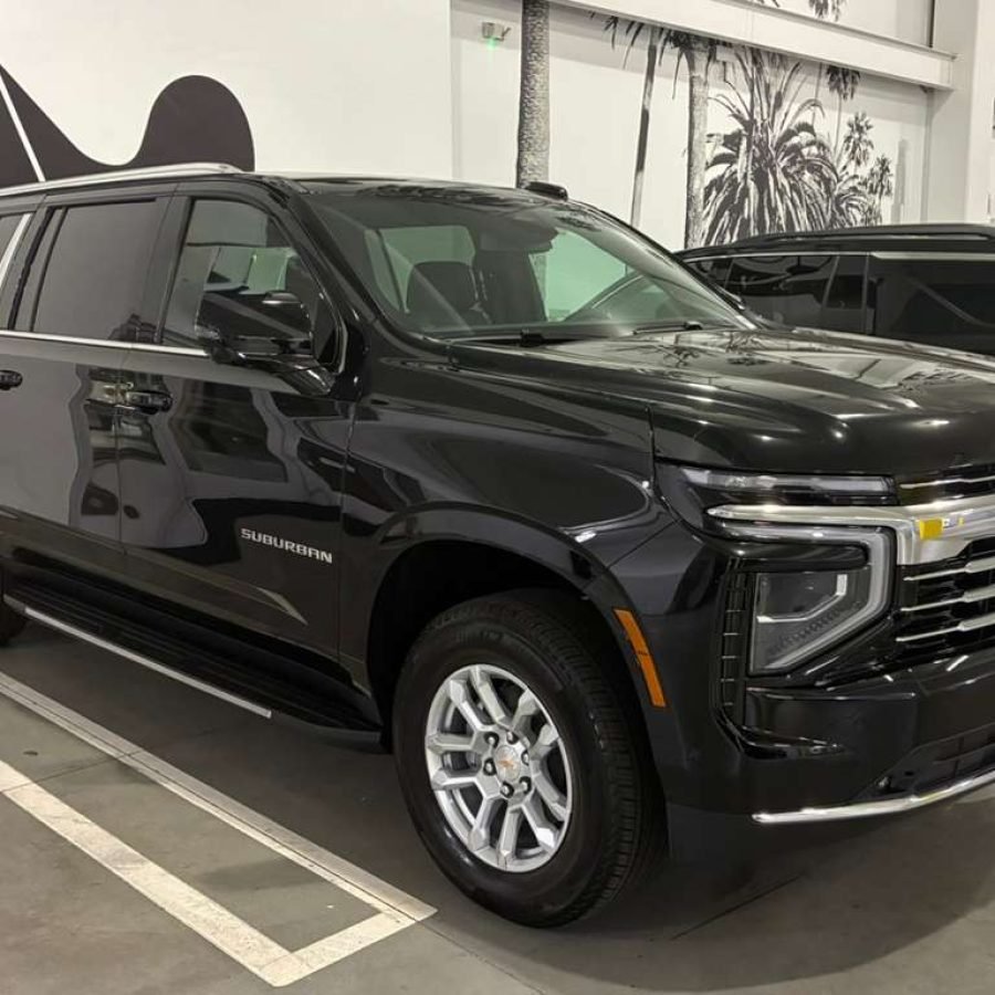 JM Transportation Service - 2025 Black Chevrolet Suburban SUV Front Side View
